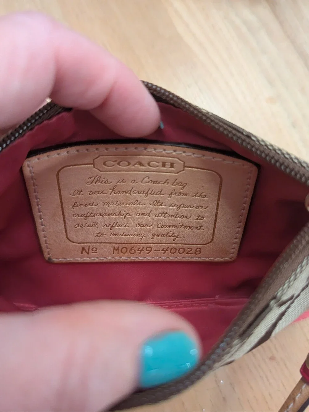 Coach Signature Canvas Wristlet in Brown and Pink
